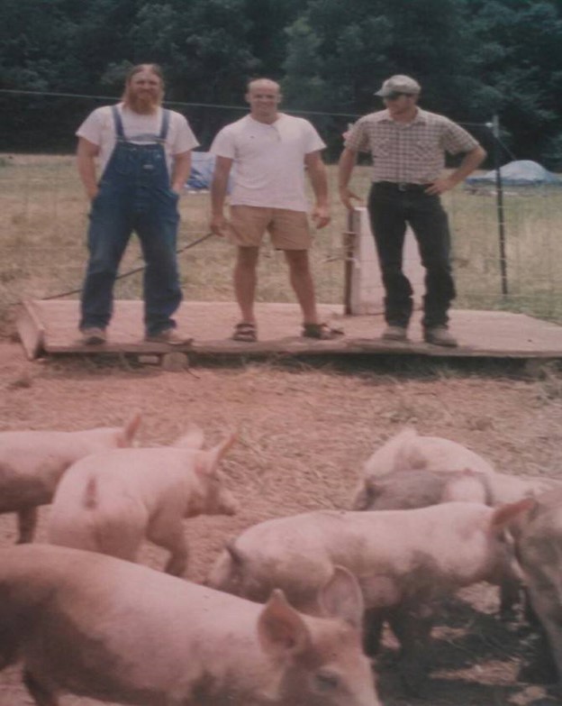 Raising hogs in Arkansas with friends.